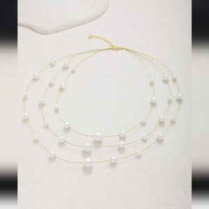 Elegant Gold and White Pearl Necklace